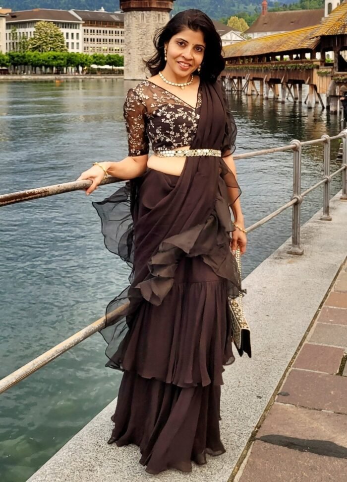 Black Ruffled Pre-Draped Saree With Embellished Blouse